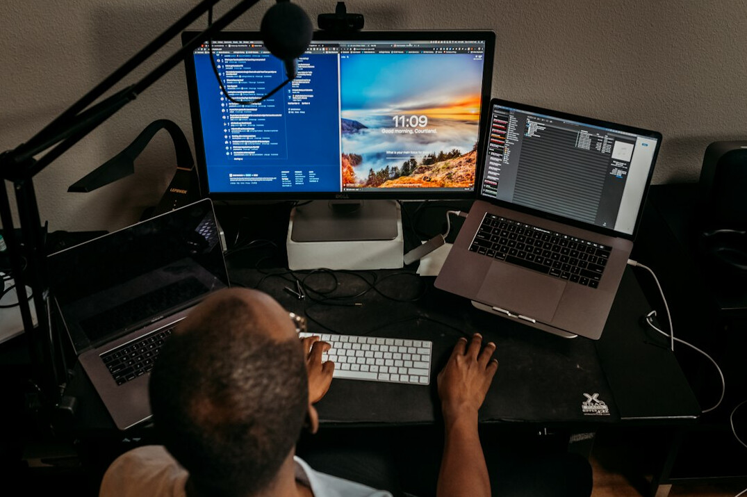 programmer coding at desk